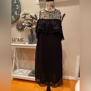 Black dress with floral mesh